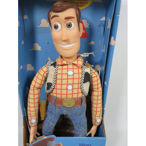 766 - Two Disney Toy Story Figures, Buzz Lightyear and Woody. Both have original boxes and appear to be in... 