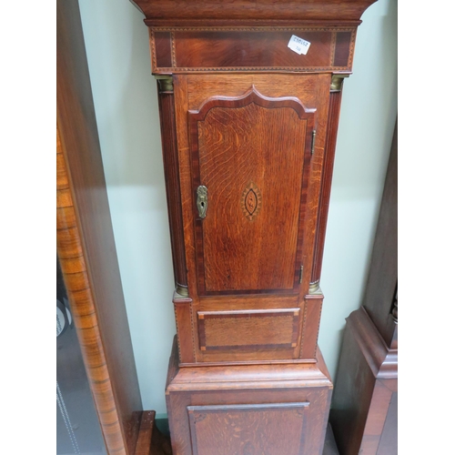 768 - Vintage Oak cased long case clock by james Wilson of Nuneaton, with two weight drive. Intermittent r... 