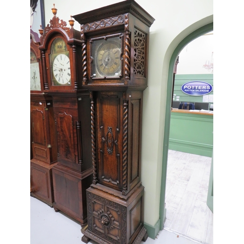 770 - Vintage long case clock with Metal face and extensive carving to body. It has non original mechanism... 