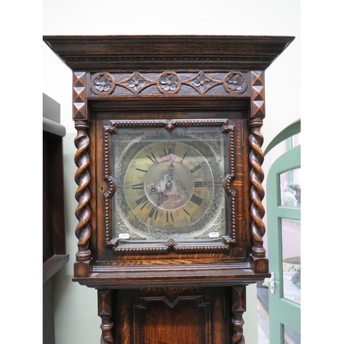 770 - Vintage long case clock with Metal face and extensive carving to body. It has non original mechanism... 