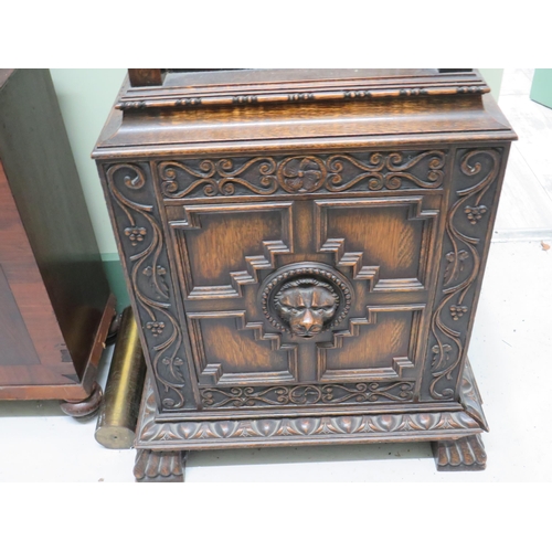 770 - Vintage long case clock with Metal face and extensive carving to body. It has non original mechanism... 