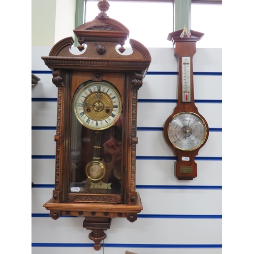 774 - German Wall mounted Vienna wall clock C1900 with key and pendulum in running order along with a wall... 