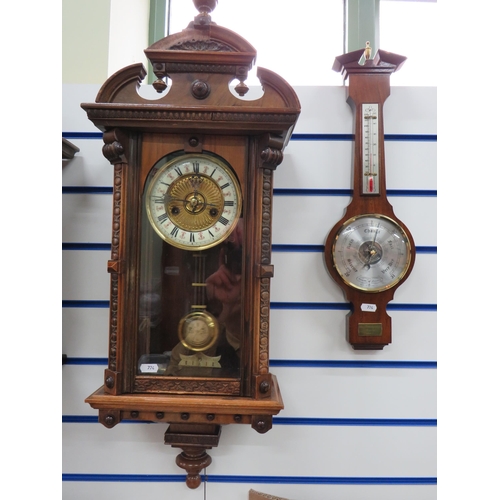 774 - German Wall mounted Vienna wall clock C1900 with key and pendulum in running order along with a wall... 