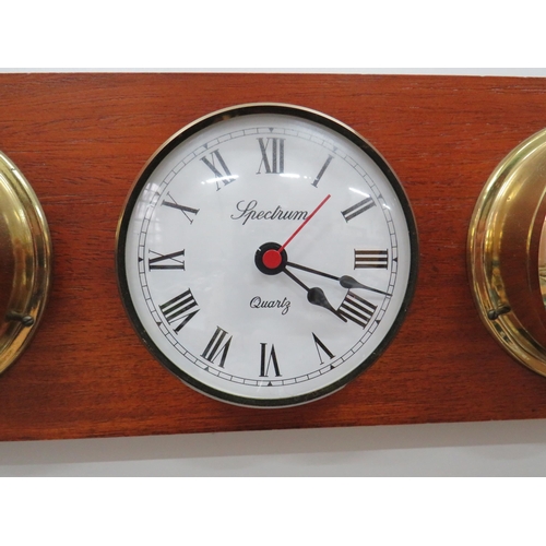 775 - Reproduction ships instruments mounted on a Brass decorated wooden board. Clock may need battery to ... 