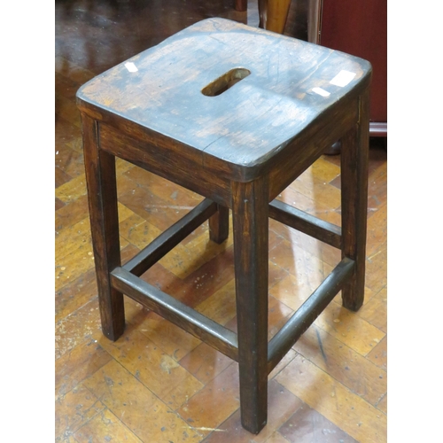 780 - Victorian Four legged Stool with hand hole to shaped seat. In very good condition. Measures 24 inche... 