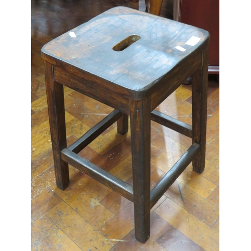 780 - Victorian Four legged Stool with hand hole to shaped seat. In very good condition. Measures 24 inche... 