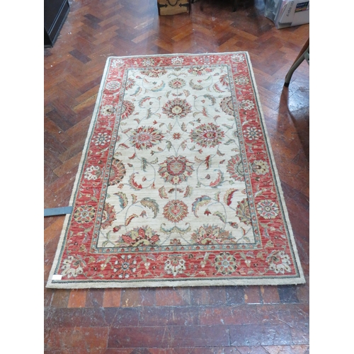 783 - Small hearth rug which measures approx 66 x 42 inches. Clean condition see photos.