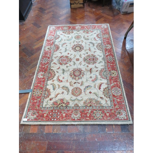 783 - Small hearth rug which measures approx 66 x 42 inches. Clean condition see photos.