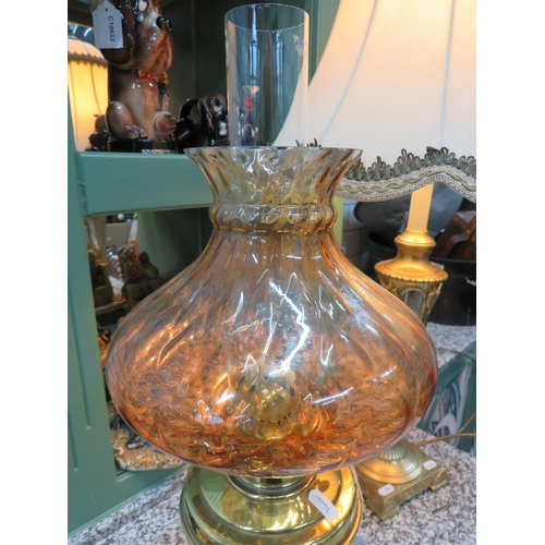 785 - Lovely Brass and Glass Oil lamp with short corinthian column base with brass reservoir. Lovely Amber... 