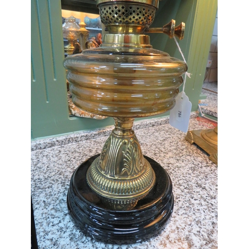 786 - Lovely Brass and Glass Oil Lamp raised on a Brass plinth with Amber glass reservoir with etched milk... 