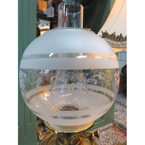 786 - Lovely Brass and Glass Oil Lamp raised on a Brass plinth with Amber glass reservoir with etched milk... 