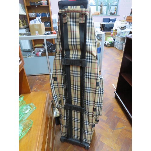 790 - Burberry Golf Bag with trolley (53 inches tall) along with a matching holdall .   All in good condit... 