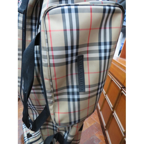 790 - Burberry Golf Bag with trolley (53 inches tall) along with a matching holdall .   All in good condit... 