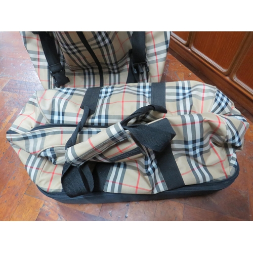 790 - Burberry Golf Bag with trolley (53 inches tall) along with a matching holdall .   All in good condit... 