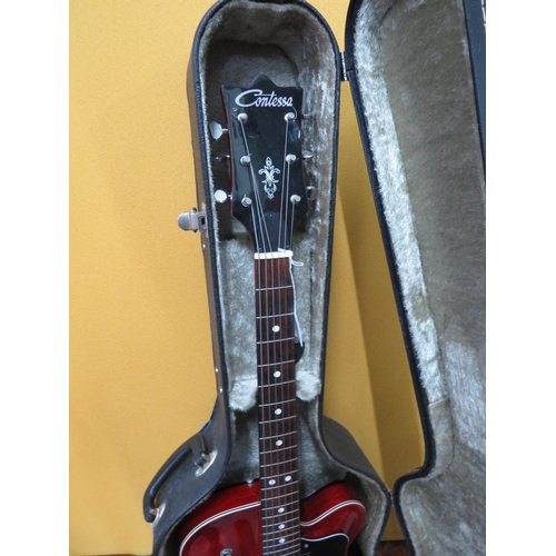 852 - Vintage Contessa EKO  Electric Accoustic Six String Guitar. Finished in Grained cherry style wood so... 