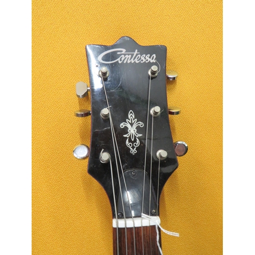 852 - Vintage Contessa EKO  Electric Accoustic Six String Guitar. Finished in Grained cherry style wood so... 