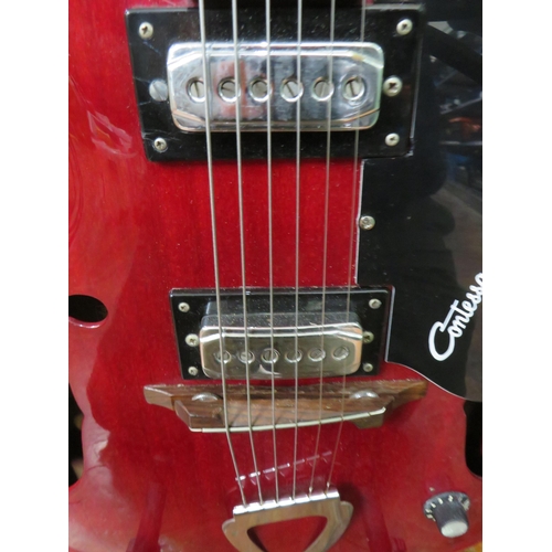 852 - Vintage Contessa EKO  Electric Accoustic Six String Guitar. Finished in Grained cherry style wood so... 