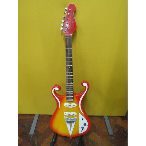 853 - Solid Bodied Six String Electric Guitar  in fair condition with light wear.  41 inches long. 3.2g. A... 