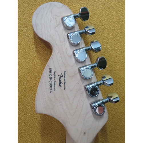 857 - Squire Stratocaster in fair condition with light superficial wear. Neck/Headstock is straight in goo... 