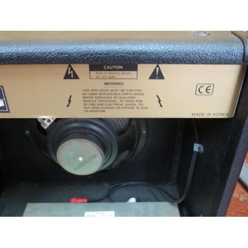 862 - Drive Practice Amp, Handle and Kettle lead missing. See photos