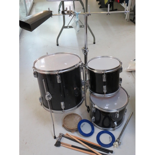 863 - Graduated set of three drums with chrome plated stand plus tamborine, cow bell , drumsticks etc. see... 