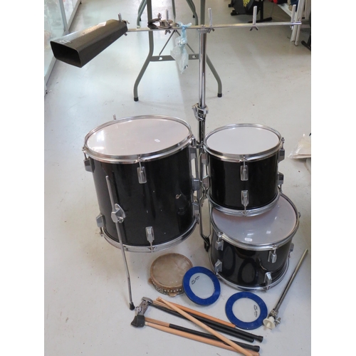 863 - Graduated set of three drums with chrome plated stand plus tamborine, cow bell , drumsticks etc. see... 