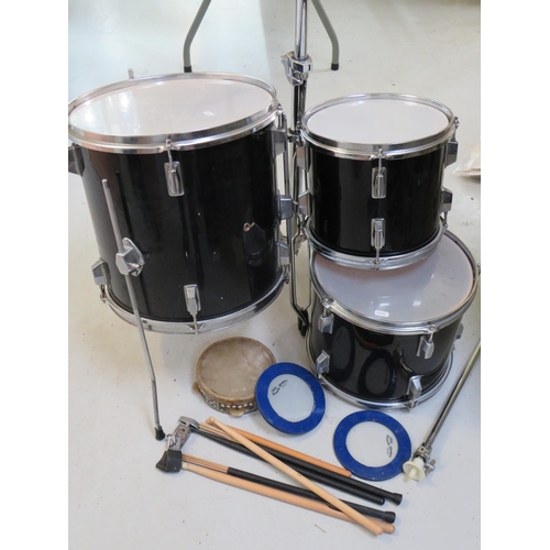 863 - Graduated set of three drums with chrome plated stand plus tamborine, cow bell , drumsticks etc. see... 