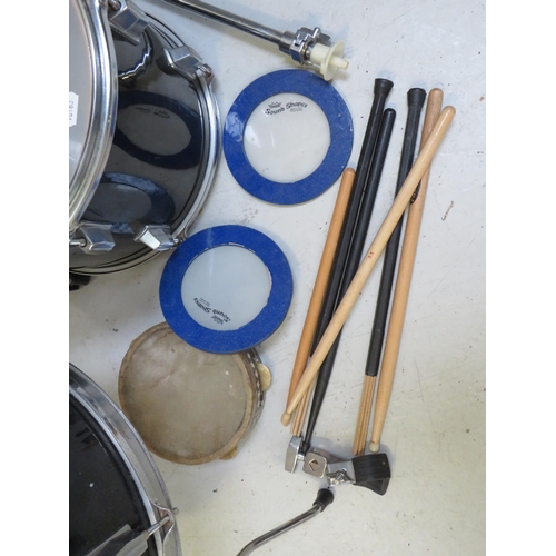 863 - Graduated set of three drums with chrome plated stand plus tamborine, cow bell , drumsticks etc. see... 