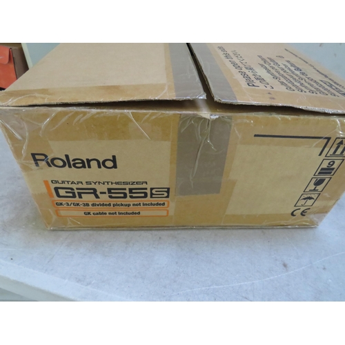 864 - Roland GR-55s Foot Operated Guitar synthesizer with power cord and pick up cables. With original box... 