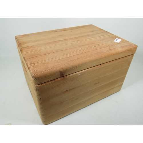 874 - Mixed lot to include a nicely made pine box with side handle holes which contains boxed Piggin figur... 