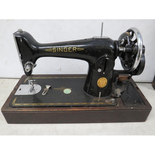 876A - Very old Singer Sewing machine with original carry case. Serial Number EC840240 in working condition... 