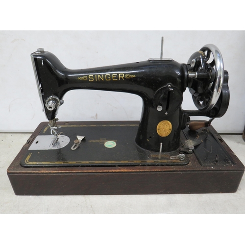 876A - Very old Singer Sewing machine with original carry case. Serial Number EC840240 in working condition... 