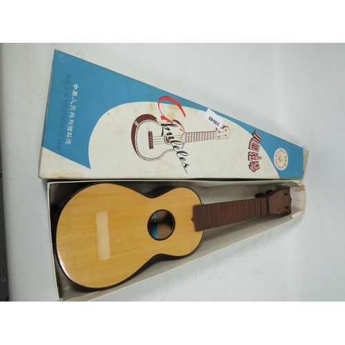 878 - Chinese ukelele with original box, no strings. See photos