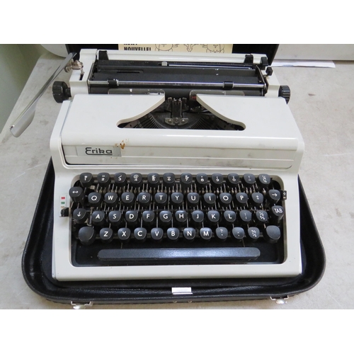 884 - Erika portable typewriter which appears to be in working order. Comes with carry case. See photos.