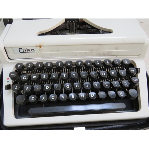 884 - Erika portable typewriter which appears to be in working order. Comes with carry case. See photos.