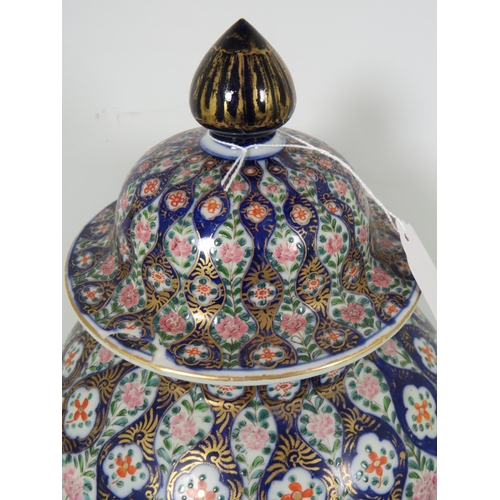 893 - Large Oriental style Ginger jar with lid. Slight nibble to underside of rim,  Measures approx 16 inc... 