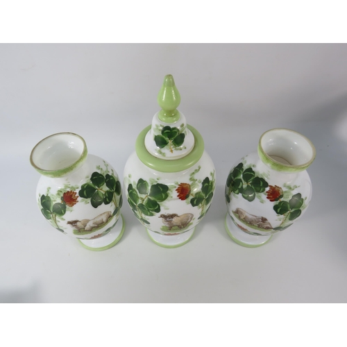 10 - Antique opaline milk glass transfer and handpainted vases and lidded jar, the tallest measures 13.5