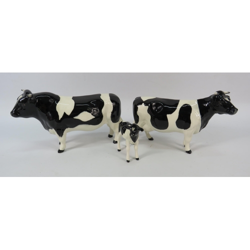 18 - Beswick Friesian Cow figurines Champion Coddington Hilt Bar, Claybury Leegwater and calf.