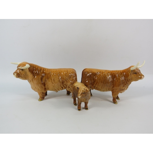 20 - Beswick Highland Cattle Bull, Cow and Calf. ( the cow has had a repair to one horn see pics)