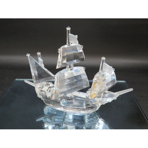 22 - Swarovski Crystal figurine of the Santa Marie ship with mirrored glass stand.