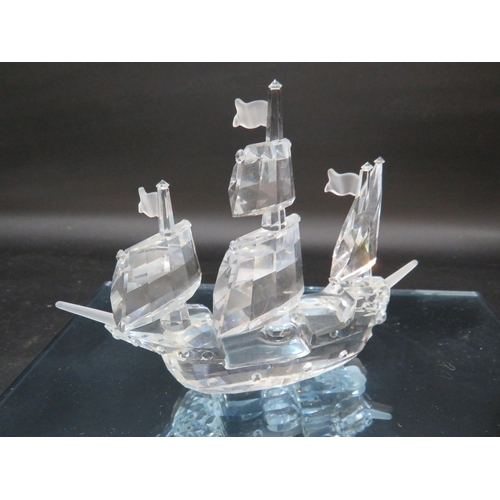 22 - Swarovski Crystal figurine of the Santa Marie ship with mirrored glass stand.