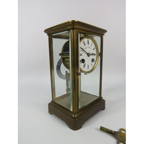 28 - Edmund Johnson enamel face French brass skeleton mantle clock with Mercury Pendulum, 8 3/4