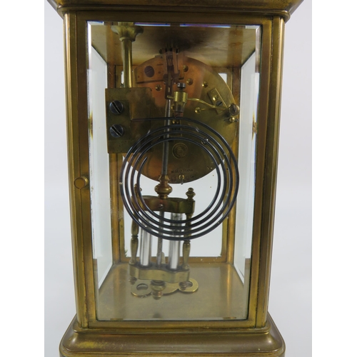 28 - Edmund Johnson enamel face French brass skeleton mantle clock with Mercury Pendulum, 8 3/4