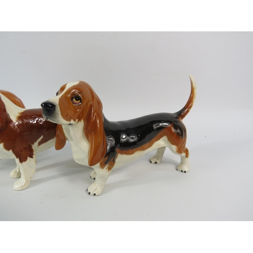 64 - Three Beswick Dog figurines, St Bernard, Cavalier King Charles and Bassett Hound, the tallest stands... 