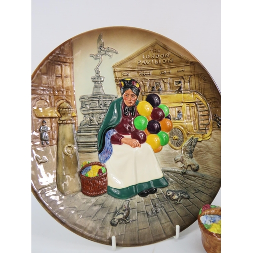 65 - Royal Doulton The Old Balloon Seller figurine plus the matching plate which is signed by Micheal Dou... 