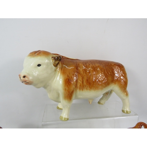 95 - Coopercraft Hereford Cow family plus other cow and sheep figurines.