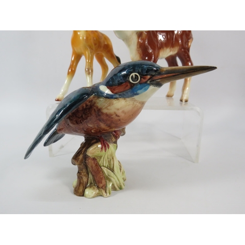 113 - Three Beswick figurines, Large Kingfisher, Hereford calf and Giraffe calf.