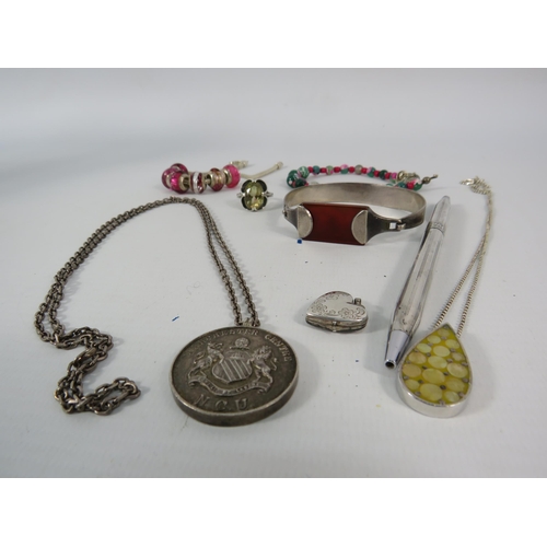 119 - Mixed sterling silver jewellery including a Manchester university antique pendant, bracelets and a r... 