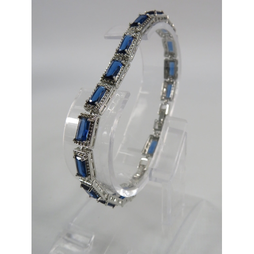 122 - 925 Silver lab created Sapphire bracelet with extention link.