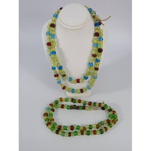 123 - Two vintage uranium glass beaded necklaces.